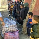 Distribution de vêtements chauds et bottes – Village d’Aglif